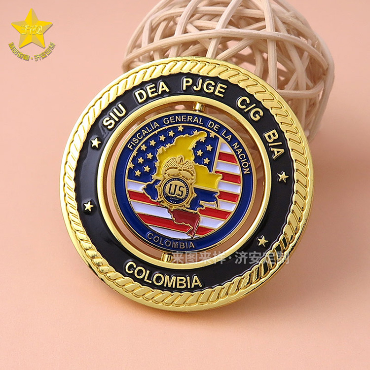 旋轉紀念章制作廠家濟安,創(chuàng)意旋轉陀螺紀念禮品