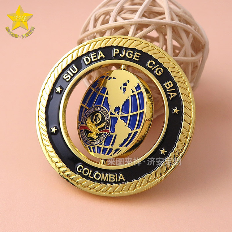 旋轉紀念章制作廠家濟安,創(chuàng)意旋轉陀螺紀念禮品