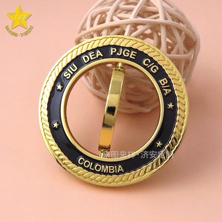 旋轉紀念章制作廠家濟安,創(chuàng)意旋轉陀螺紀念禮品