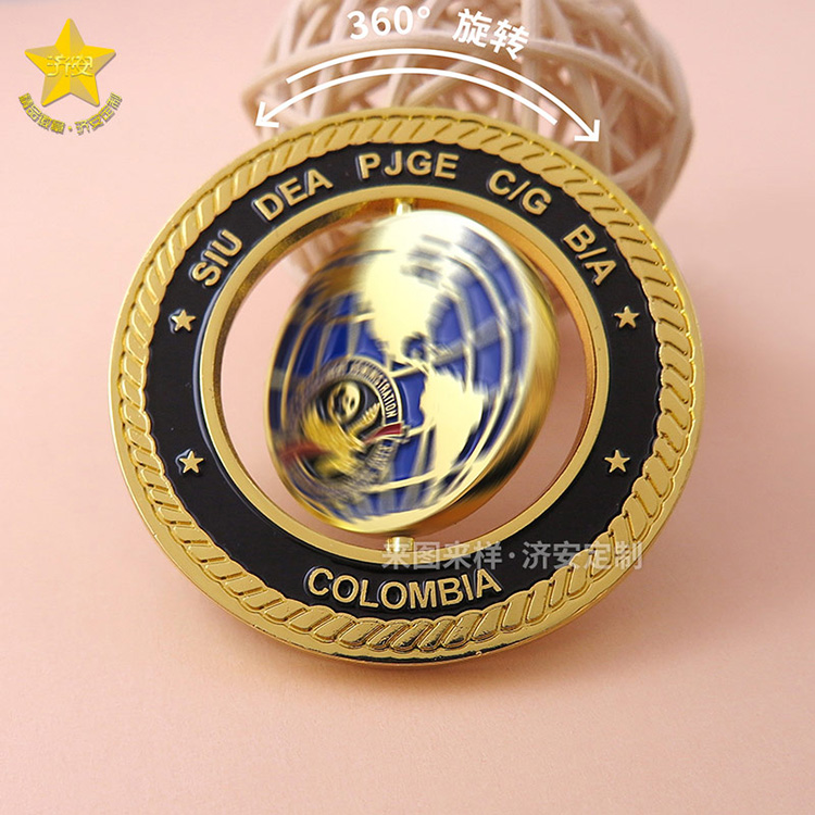 旋轉紀念章制作廠家濟安,創(chuàng)意旋轉陀螺紀念禮品